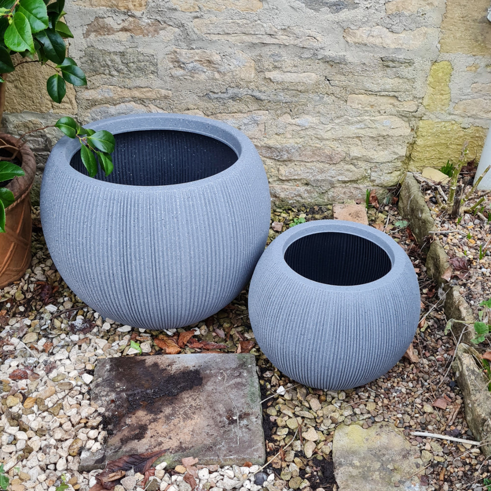 set of ridged ball stone planter