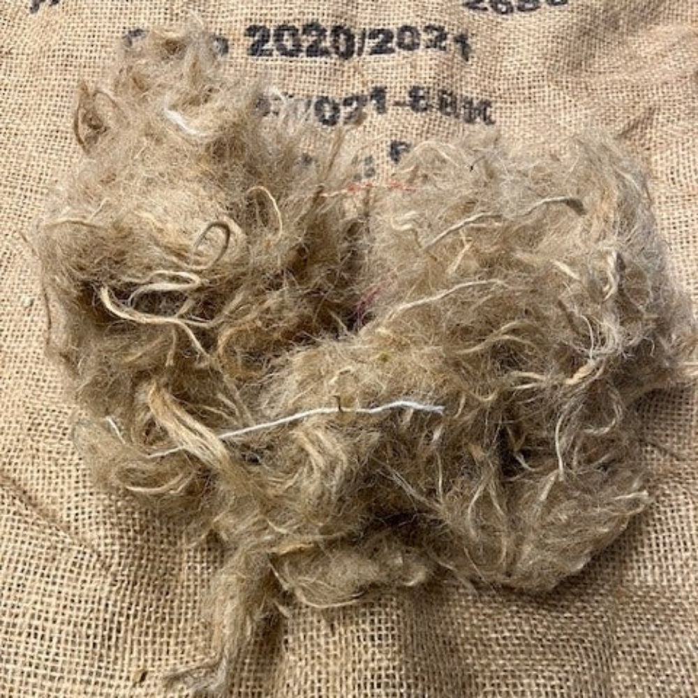 shredded coffee sacks to make the tree mulch