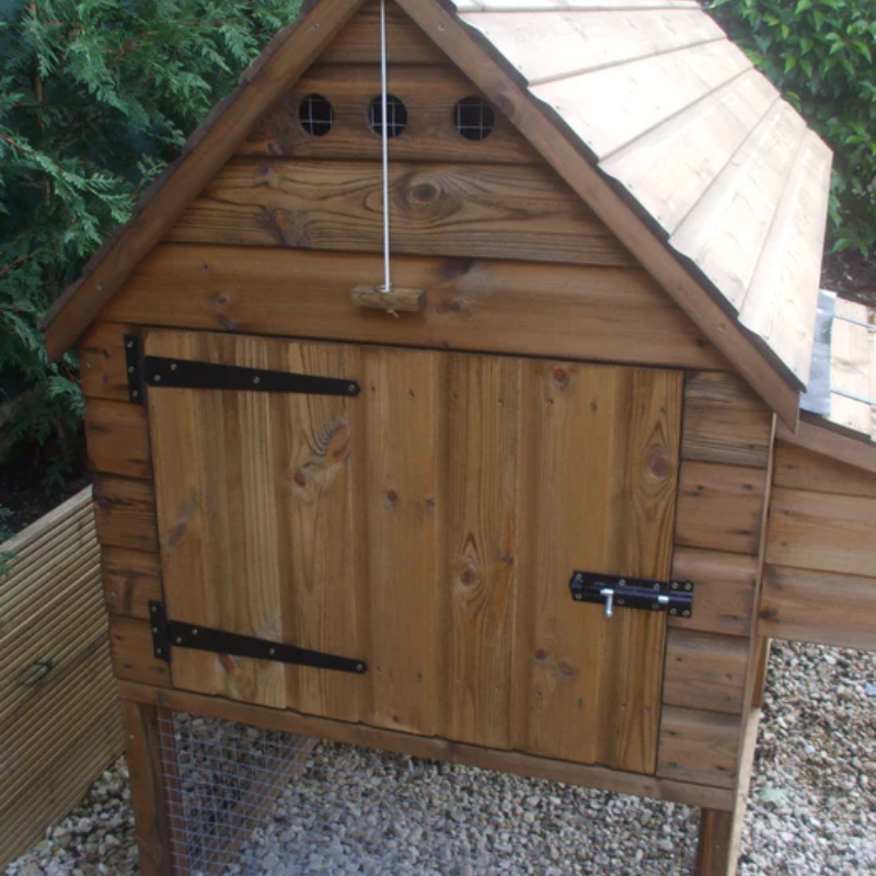Poultry house with door. Wooden