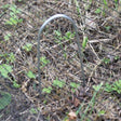 A single U-pin ground staple