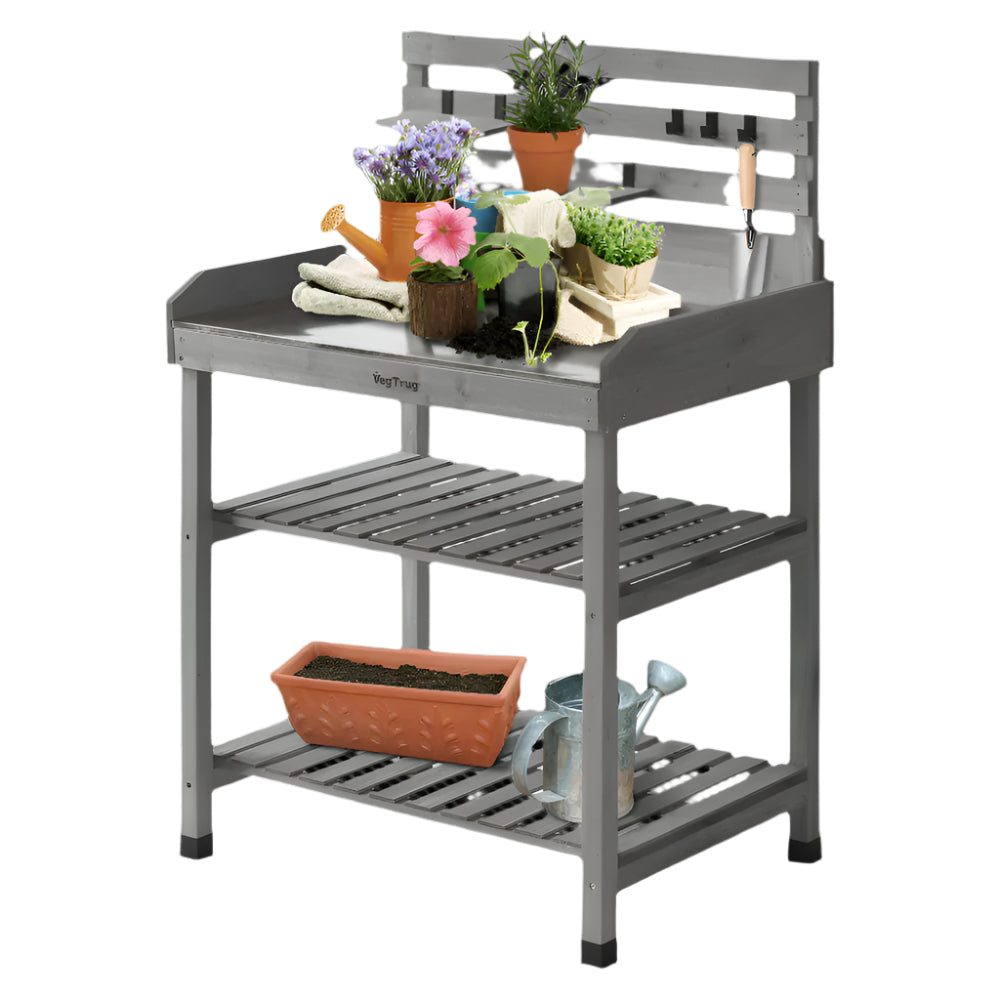 garden equipment on wooden grey wash gardening potting table