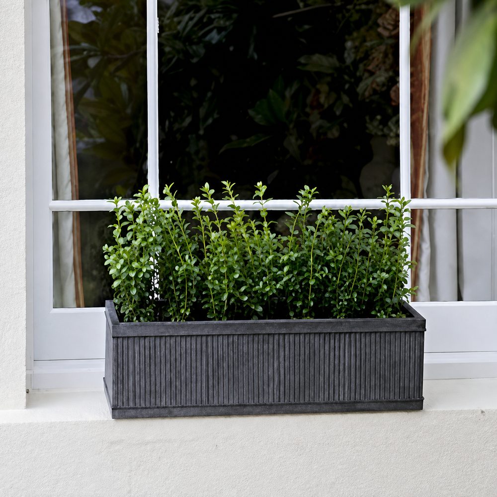 Grey window planter on window ledge