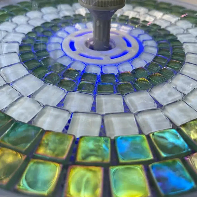 Mosaic Water fountain close up with lights