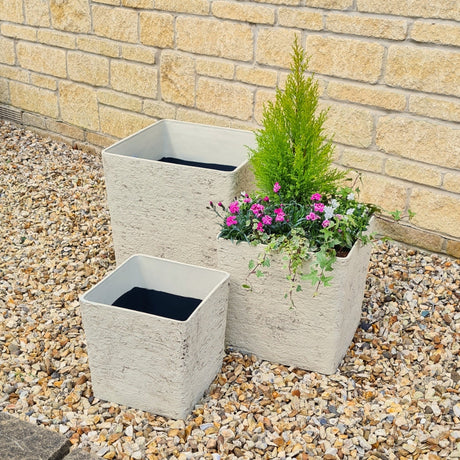 verona style square planter in garden