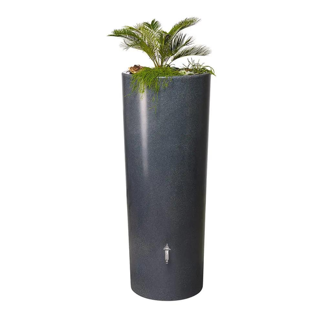 A tall, cylindrical black or grey stone water butt with a green plant on top.