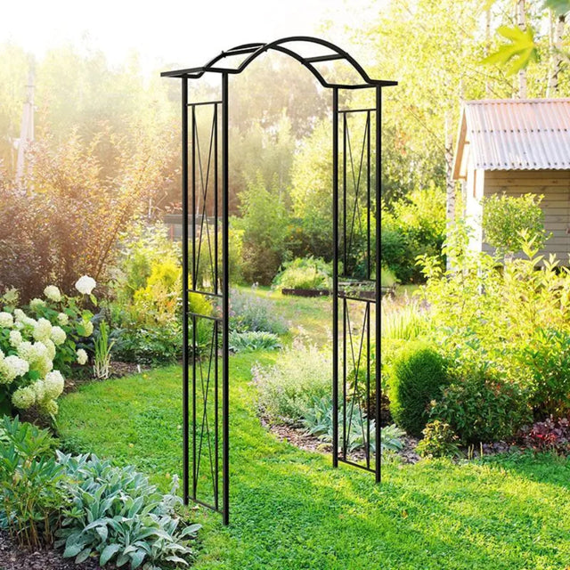 wave top metal arch in garden