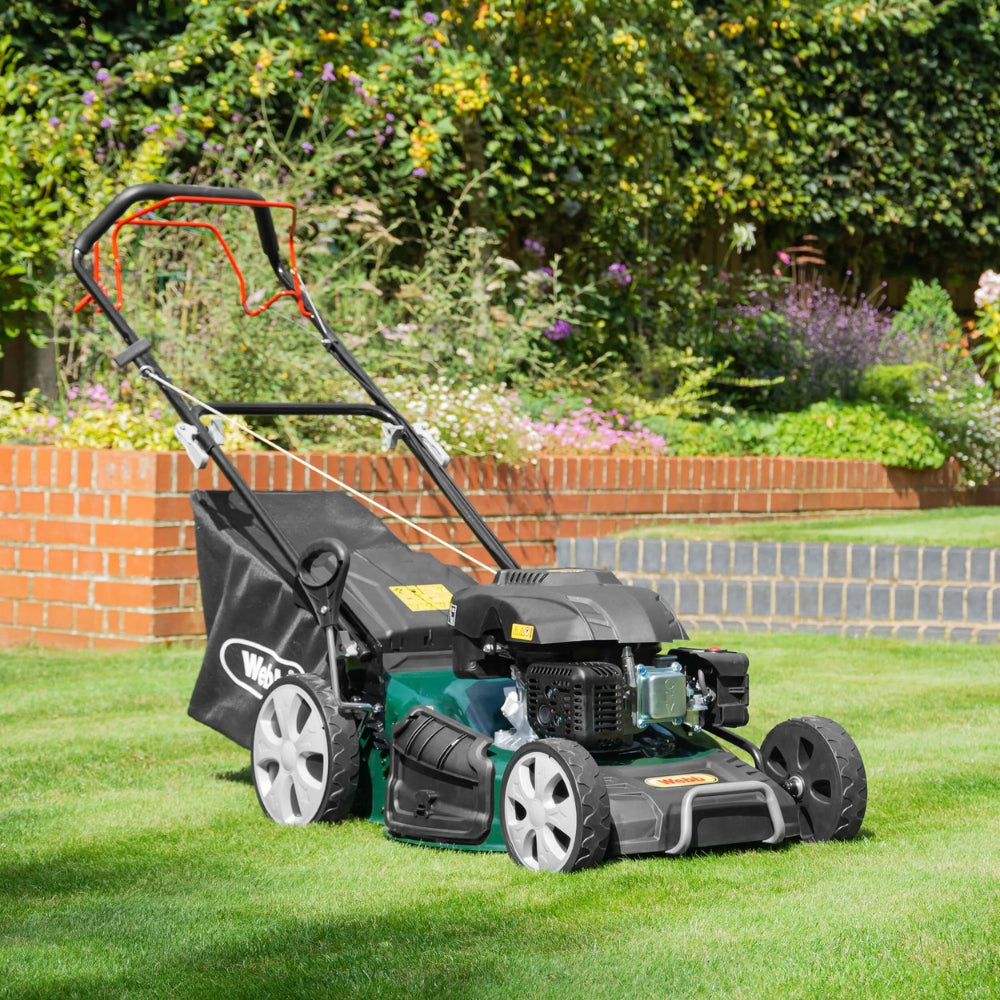 webb petrol lawnmower in garden