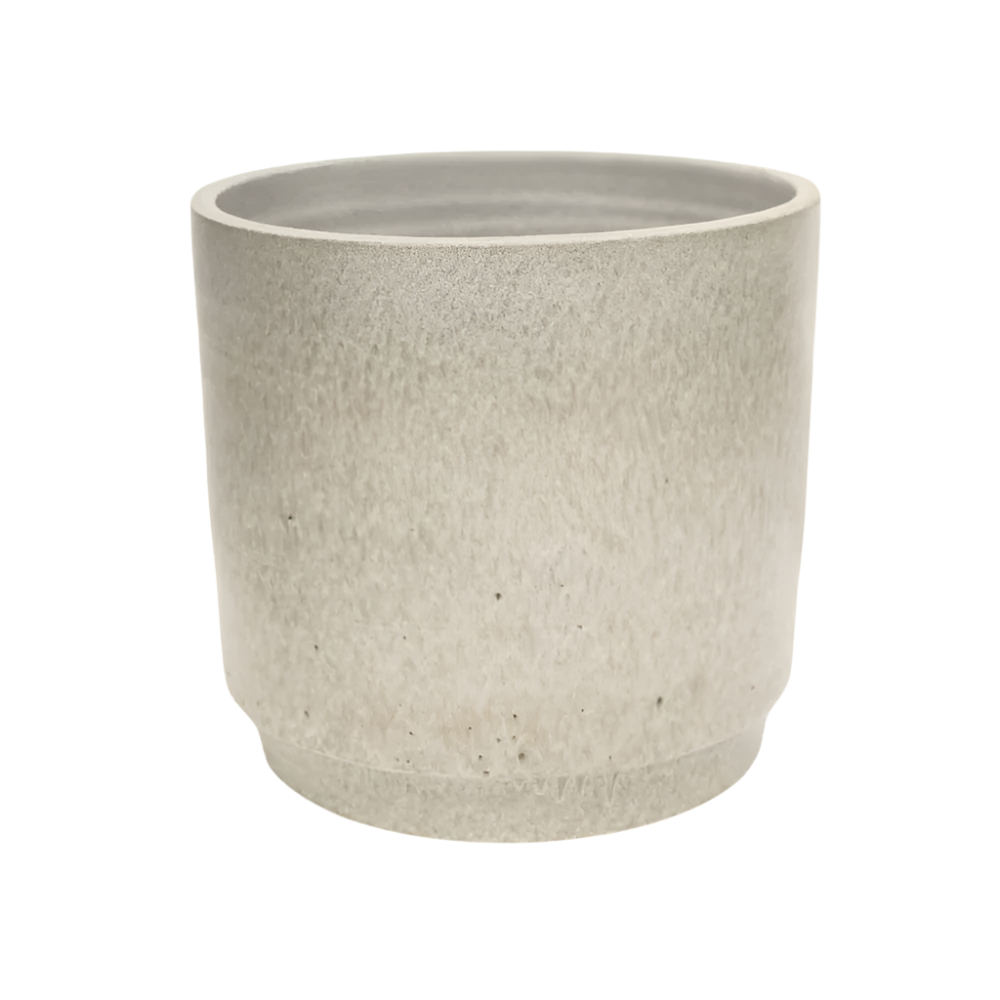 Cream marble effect planter on white background