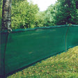 windbreak shade netting in a garden set up as a fence