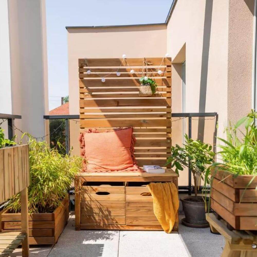 Small outdoor patio with wooden furniture