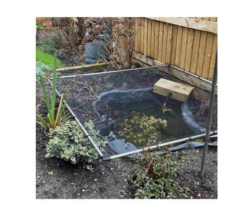 Pond with garden netting and protection on