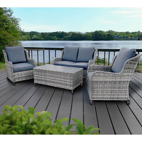 rattan garden furniture by lake