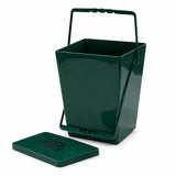 Green kitchen compost bin with a lid on a white background
