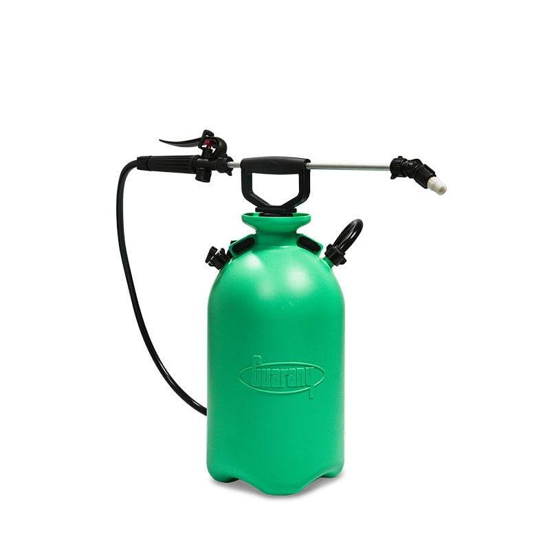 A green nematode compression sprayer with a black nozzle and hose