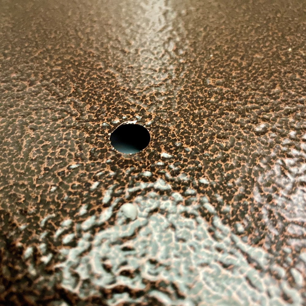 drainage hole in the bronze black garden planter