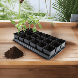 Black growing tray with 18 compartments on a  wooden table