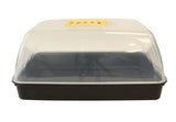 black seed tray with a lid creating a propagator with lid and vent on white background
