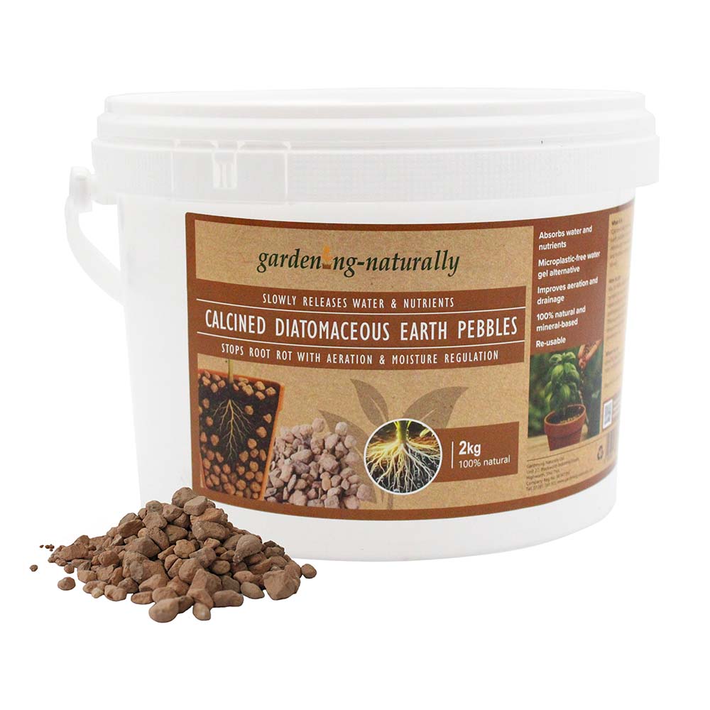 2kg tub of calcined diatomaceous earth pebbles with loose pebbles shown.