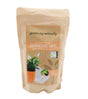 A 500g stand-up pouch of Garden.ng Naturally Diatomaceous Earth, featuring a kraft paper design with a central label showing a plant, white diatom powder, and an OF&G Organic badge.