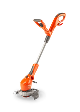 Corded grass strimmer on clear background