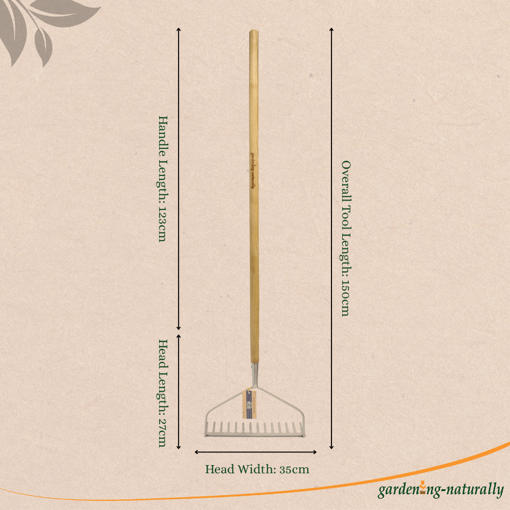 Garden rake with measurements on a beige background