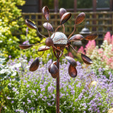 Solar wind spinner in the garden at day time