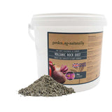 5kg tub of volcanic rock dust soil improver with loose rock dust shown.