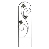 A black metal plant pot trellis with yellow accents and bee silhouettes on it