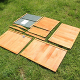 Beehive composter components led on a lawn