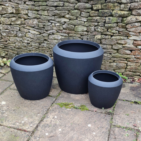 black castille planter set on patio