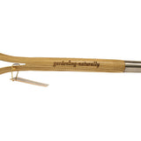 Bamboo garden fork handle with 'gardening-naturally' engraving