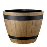 Wooden planter with black bands on a white background