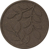 A circular brown stepping stone with a large imprinted leaf design in the center.