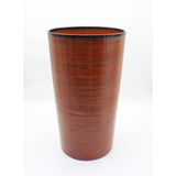 Brown cylindrical vase on a white background