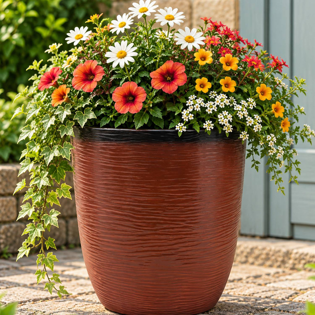 Burnt orange pot with flowers 