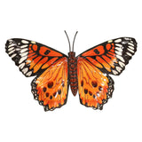 Single orange butterfly on a white wall garden decoration