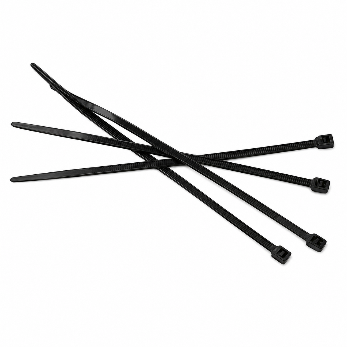 A group of black cable ties arranged on a light background.