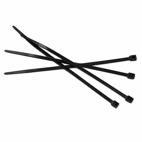 A group of black cable ties arranged on a light background.
