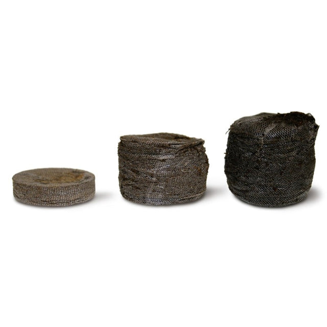 Two compressed coir pellets of different sizes, intended for use in gardening for seed and cutting propagation.