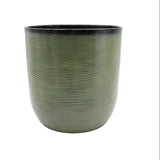 Green textured pot on a white background
