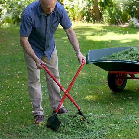 Darlac Grab N Lift product being used to pick up grass cuttings