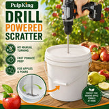PulpKing Drill Powered Scatter for apples and pears, featuring a white bucket with a drill attachment being used to mix pomace, set against a rustic apple orchard background with a hand holding the drill.