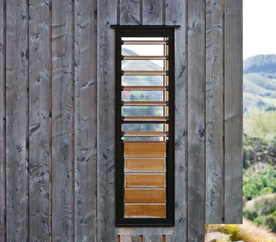 Stained cladding showing eco wood treatment colour