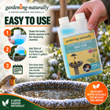Gardening Naturally Frost Stop being added to a bird bath, showing how to measure and use the winter treatment to help prevent freezing.