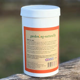 A white plastic container of gardening-naturally tree bark fruit tree grease with instructions