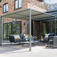 Garden Gazebo with sliding roof  showing furniture and next to house