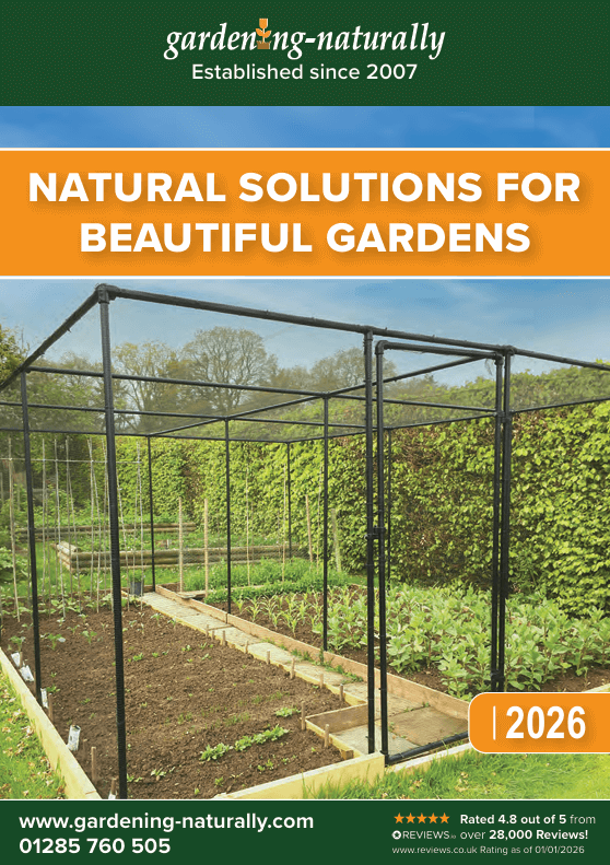 Gardening Naturally catalog cover with garden shed and garden scene, featuring branding and contact information.