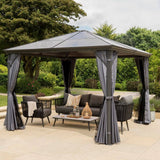 Polycarbonate garden gazebo with furniture in garden