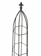 Decorative black metal obelisk with a fleur-de-lis design on a white background