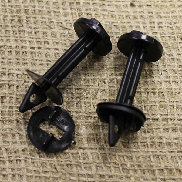 Greenhouse insulation clips on hessian background